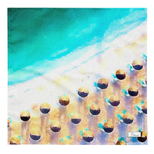 Load image into Gallery viewer, Bandana featuring an artwork of an aerial view of a Greek beach, with blue sea, golden sand, and umbrellas.